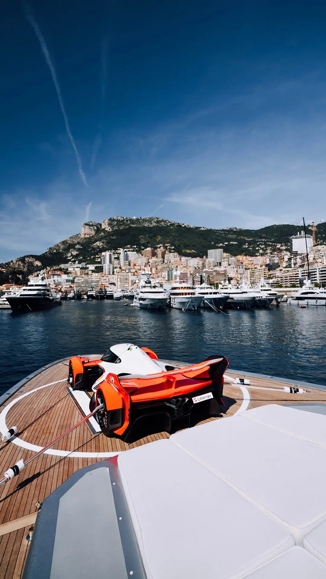 A supercar exhibited on the deck of the Ultimate Superyacht in Monaco